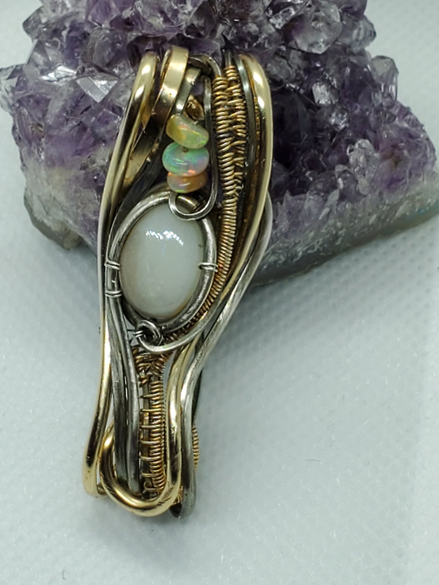 Double bail white opal