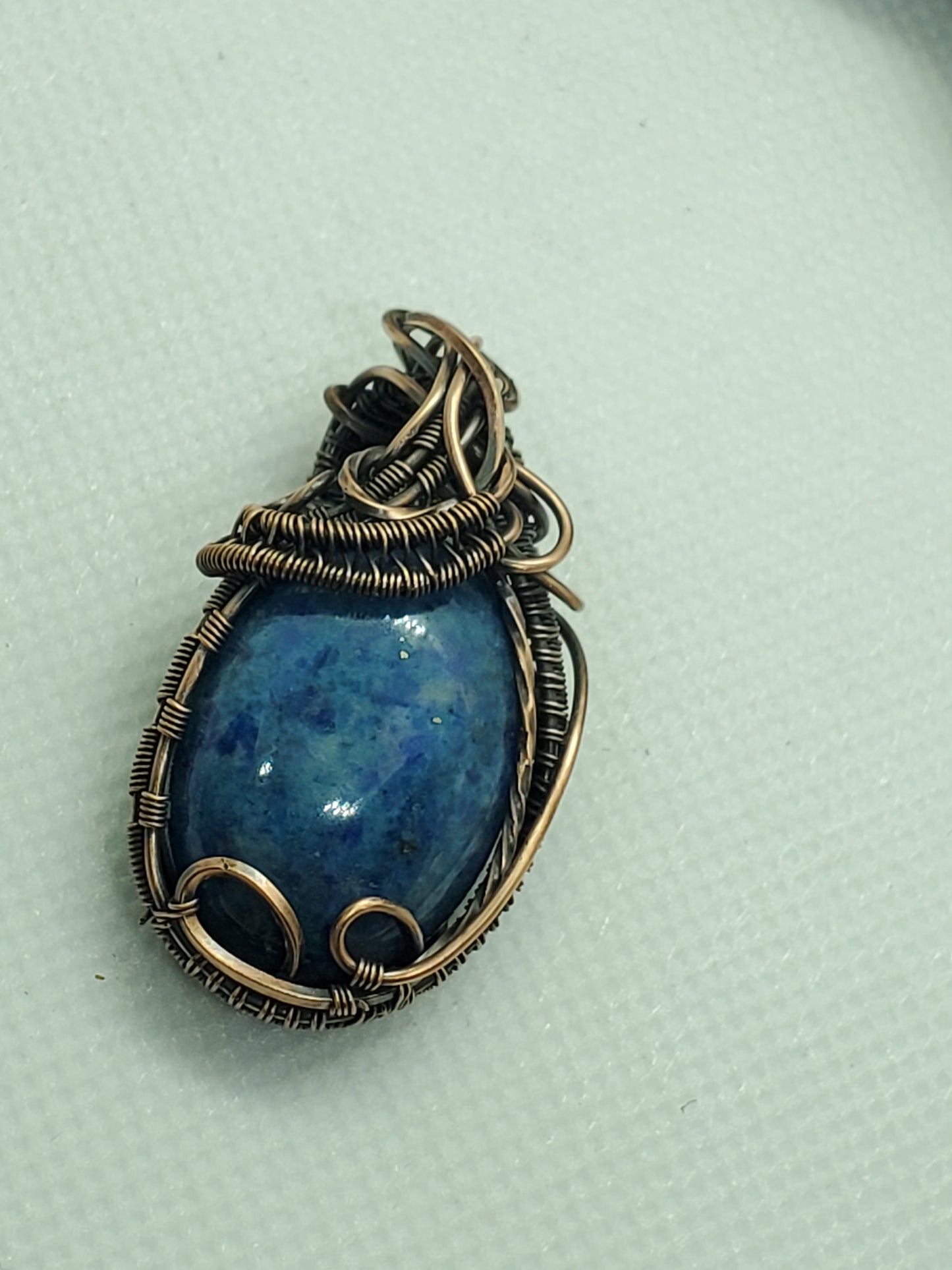Blue denium agate in copper