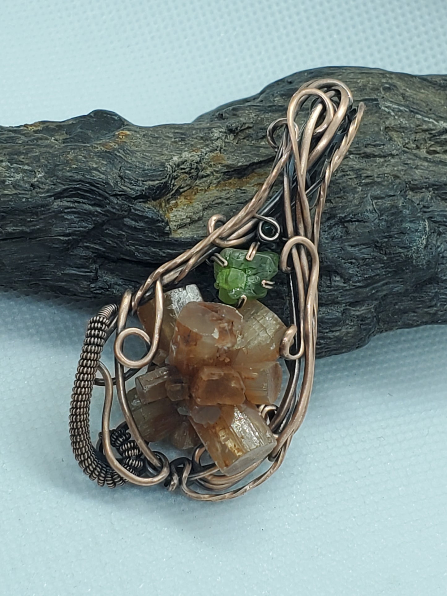 Aragonite, tumbled peridot & emerald