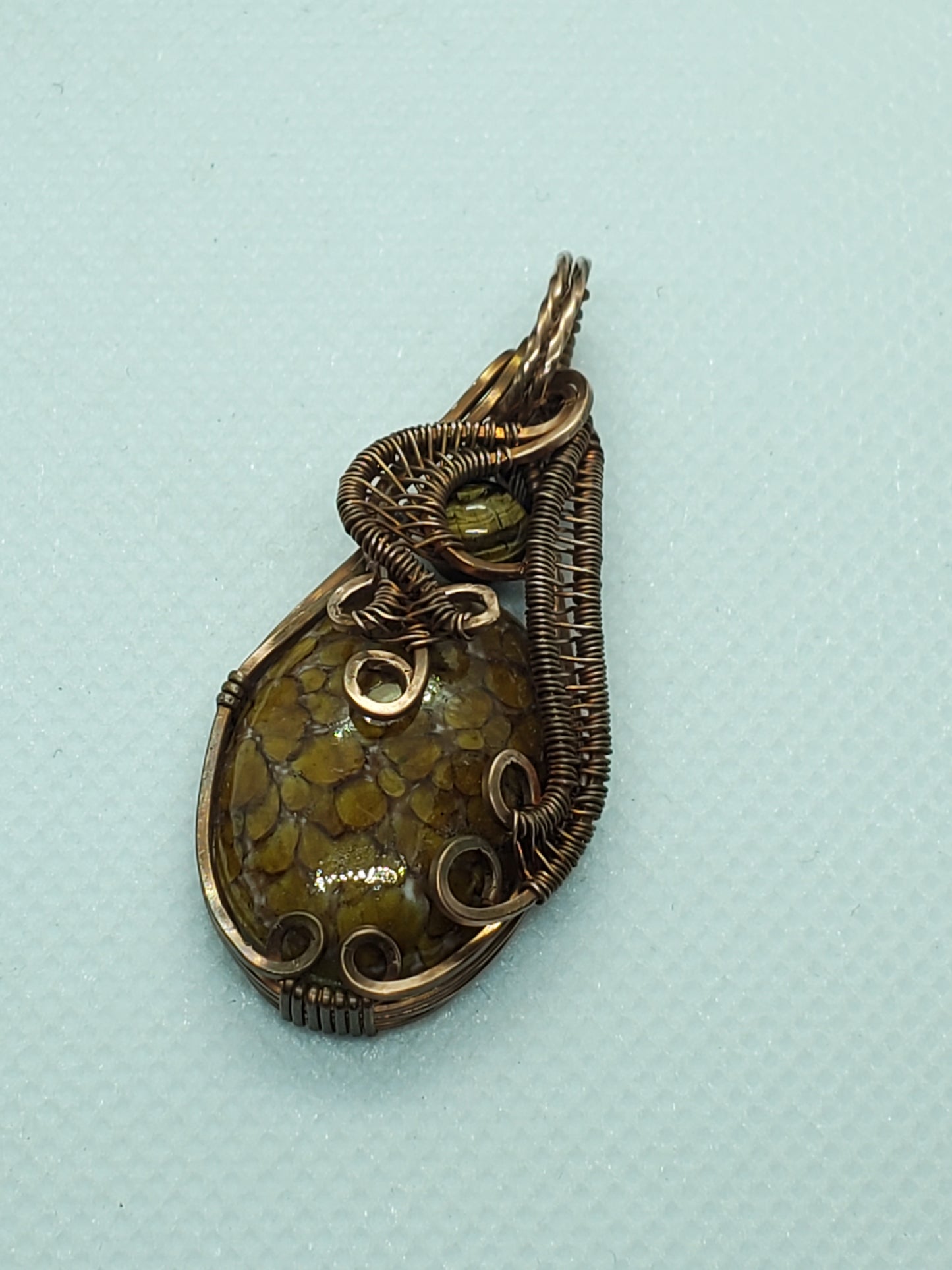 Honeycomb glass cab and tigereye bead